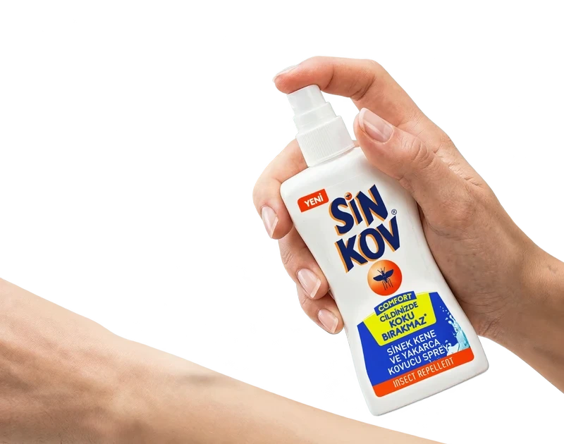 Comfort şişesini tutan el